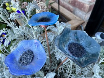 Display your glass flowers indoors our outside in your garden