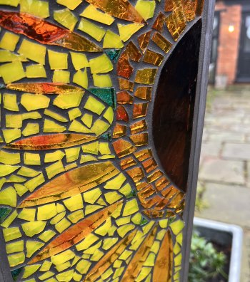 Mirror glass makes beautiful garden art