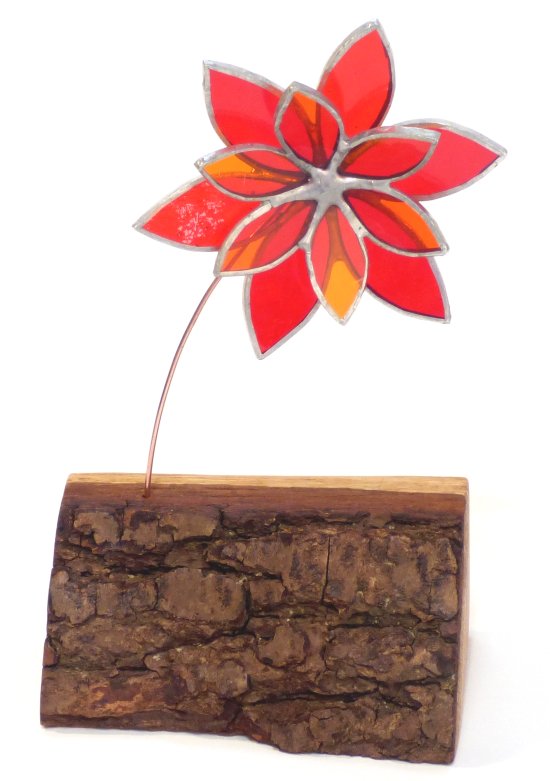 Copper foiled stained glass flowers on a reclaimed wooden base made by Vitreus Art