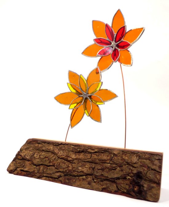 Copper foiled stained glass flowers on a reclaimed wooden base made by Vitreus Art
