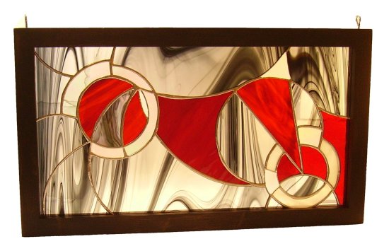 Satelliet stained glass art ready to hang in a window