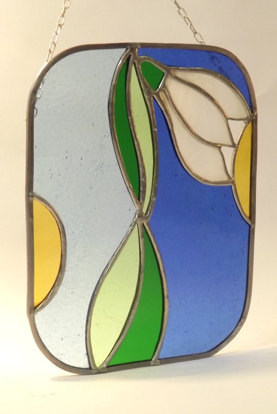 Snowdrop stained glass art ready to hang in a window