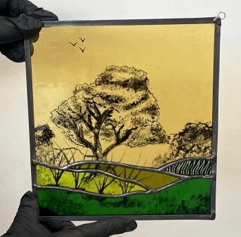 A finished stained glass painted panel made at Vitreus Art